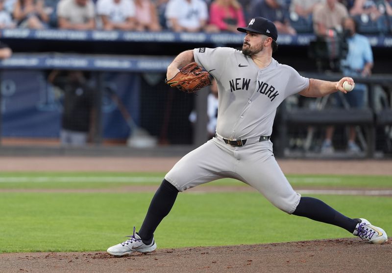 Apr 18, 2025; Tampa, Florida, USA; New York Yankees pitcher Carlos Rodon (55) throws a pitch against the Tampa Bay Rays during the first inning at George M. Steinbrenner Field. Mandatory Credit: Dave Nelson-Imagn Images