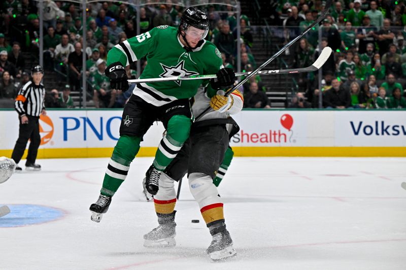 May 5, 2024; Dallas, Texas, USA; Dallas Stars defenseman Thomas Harley (55) leaps out of the way of the puck in the Vegas Golden Knights zone during the second period in game seven of the first round of the 2024 Stanley Cup Playoffs at American Airlines Center. Mandatory Credit: Jerome Miron-USA TODAY Sports