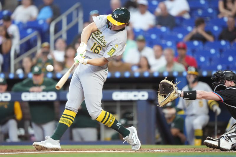 May 2, 2025; Miami, Florida, USA;  Oakland Athletics first baseman Nick Kurtz (16) hits a single to right field and scores a run against the Miami Marlins in the second inning at loanDepot Park. Mandatory Credit: Jim Rassol-Imagn Images