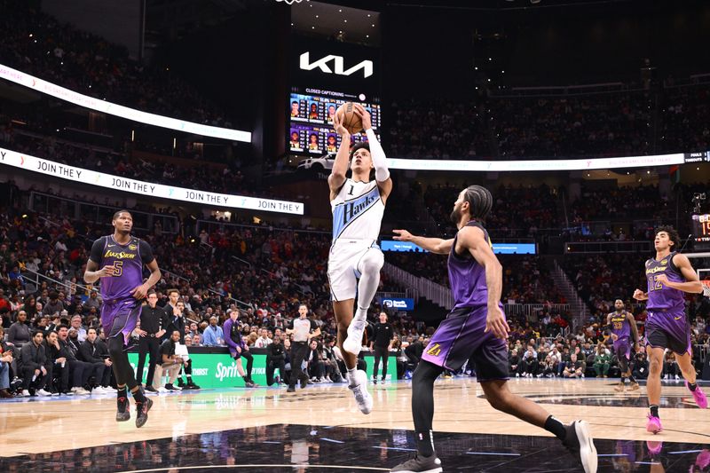 ATLANTA, GA - DECEMBER 6: Jalen Johnson #1 of the Atlanta Hawks drives to the basket during the game against the Los Angeles Lakers on December 6, 2024 at State Farm Arena in Atlanta, Georgia.  NOTE TO USER: User expressly acknowledges and agrees that, by downloading and/or using this Photograph, user is consenting to the terms and conditions of the Getty Images License Agreement. Mandatory Copyright Notice: Copyright 2024 NBAE (Photo by Adam Hagy/NBAE via Getty Images)