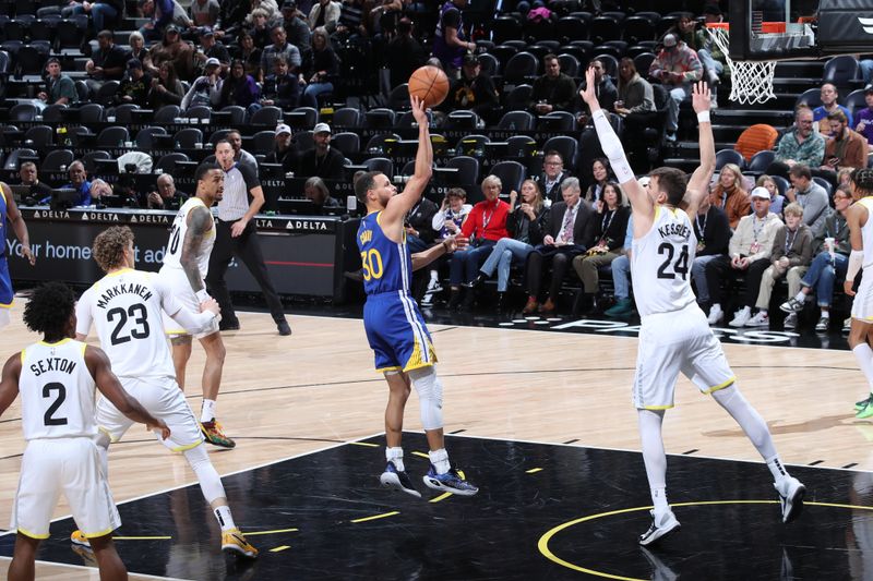 SALT LAKE CITY, UT - FEBRUARY 15: Stephen Curry #30 of the Golden State Warriors drives to the basket during the game against the Utah Jazz on February 15, 2024 at Delta Center in Salt Lake City, Utah. NOTE TO USER: User expressly acknowledges and agrees that, by downloading and or using this Photograph, User is consenting to the terms and conditions of the Getty Images License Agreement. Mandatory Copyright Notice: Copyright 2024 NBAE (Photo by Melissa Majchrzak/NBAE via Getty Images)