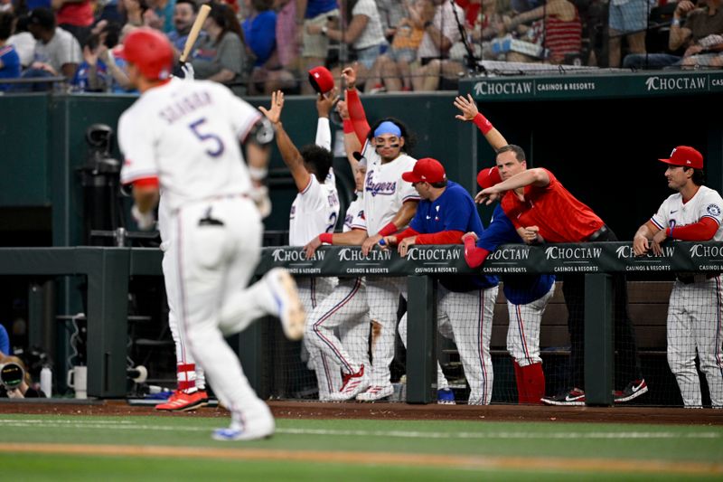Jun 28, 2025; Arlington, Texas, USA; The Texas Rangers bench celebrates after Rangers shortstop Corey Seager (5) hits a two run home run against the Seattle Mariners during the third inning at Globe Life Field. Mandatory Credit: Jerome Miron-Imagn Images