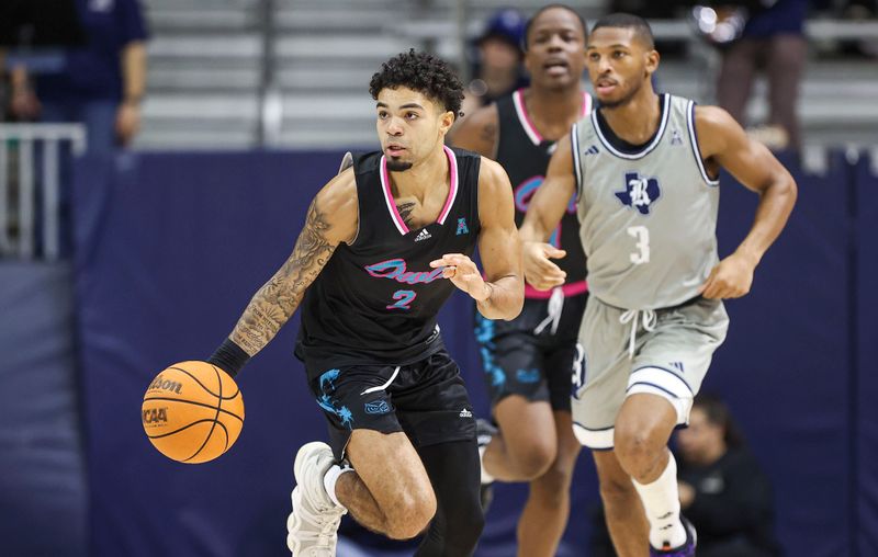 Jan 24, 2024; Houston, Texas, USA; Florida Atlantic Owls guard Nick Boyd (2) controls the ball during the first half against the Rice Owls at Tudor Fieldhouse. Mandatory Credit: Troy Taormina-USA TODAY Sports