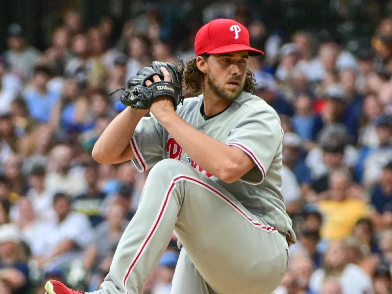 Sep 2, 2023; Milwaukee, Wisconsin, USA; Philadelphia Phillies pitcher Aaron Nola (27) pitches against the Milwaukee Brewers in the first inning at American Family Field. Mandatory Credit: Benny Sieu-USA TODAY Sports