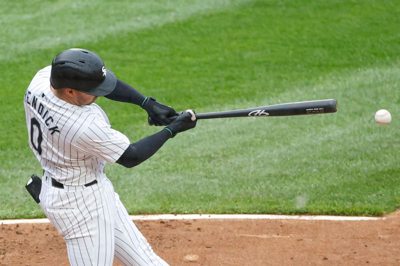 Jun 8, 2024; Chicago, Illinois, USA; Chicago White Sox third baseman Danny Mendick (0) doubles against the Boston Red Sox during the fifth inning at Guaranteed Rate Field. Mandatory Credit: Kamil Krzaczynski-USA TODAY Sports