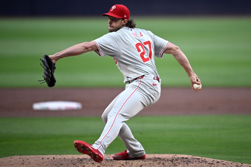 Apr 26, 2024; San Diego, California, USA; Philadelphia Phillies starting pitcher Aaron Nola (27) throws a pitch against the San Diego Padres during the first inning at Petco Park. Mandatory Credit: Orlando Ramirez-USA TODAY Sports