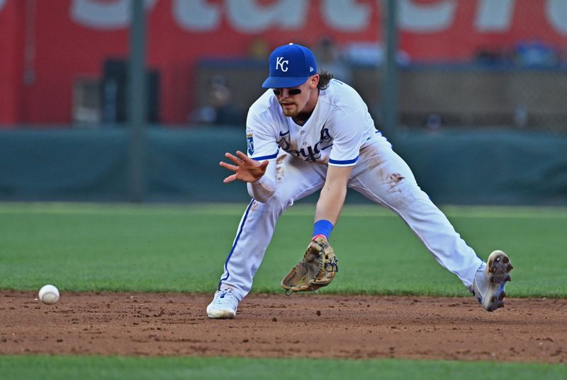 Jul 29, 2023; Kansas City, Missouri, USA;  Kansas City Royals shortstop Bobby Witt Jr. (7) fields a ground ball during the third inning against the Minnesota Twins at Kauffman Stadium. Mandatory Credit: Peter Aiken-USA TODAY Sports