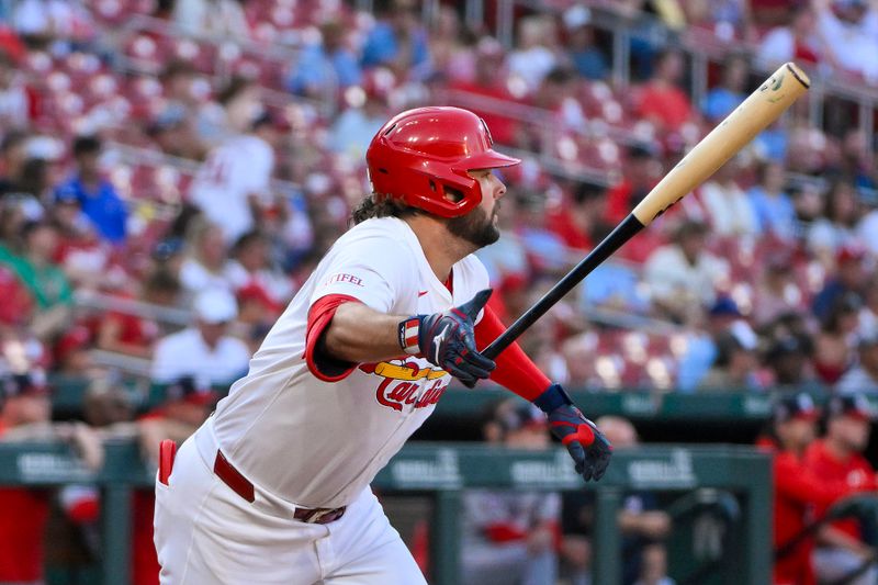Jul 10, 2025; St. Louis, Missouri, USA;  St. Louis Cardinals right fielder Alec Burleson (41) hits a one run single against the Washington Nationals during the third inning at Busch Stadium. Mandatory Credit: Jeff Curry-Imagn Images
