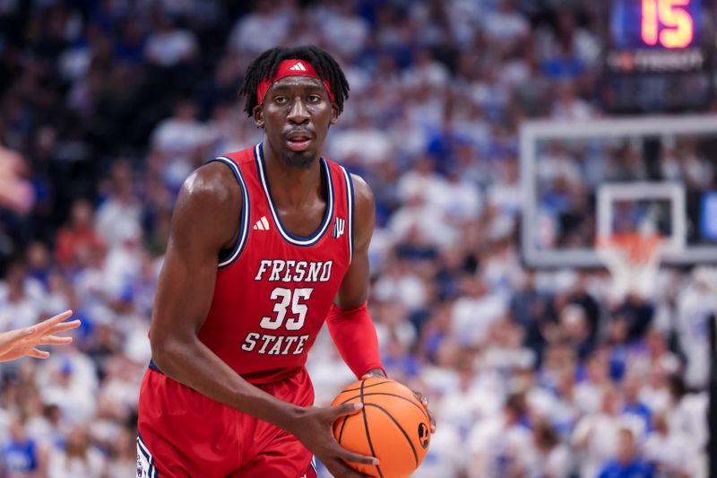 Dec 1, 2023; Salt Lake City, Utah, USA; Fresno State Bulldogs center Eduardo Andre (35) looks to pass the ball against the Brigham Young Cougars during the second half at Delta Center. Mandatory Credit: Rob Gray-USA TODAY Sports