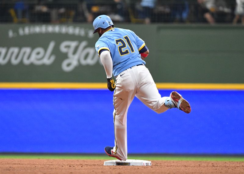 Sep 15, 2023; Milwaukee, Wisconsin, USA; Milwaukee Brewers first baseman Carlos Santana (41) rounds the bases after hitting a home run against the Washington Nationals in the fifth inning at American Family Field. Mandatory Credit: Michael McLoone-USA TODAY Sports