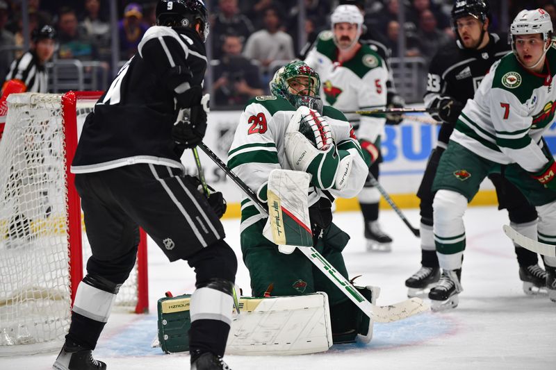 Mar 20, 2024; Los Angeles, California, USA; Minnesota Wild goaltender Marc-Andre Fleury (29) blocks a shot against the Los Angeles Kings during the second period at Crypto.com Arena. Mandatory Credit: Gary A. Vasquez-USA TODAY Sports