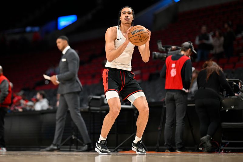 PORTLAND, OREGON - MARCH 08: Dalano Banton #5 of the Portland Trail Blazers warms up before the game against the Houston Rockets at the Moda Center on March 08, 2024 in Portland, Oregon. NOTE TO USER: User expressly acknowledges and agrees that, by downloading and or using this photograph, User is consenting to the terms and conditions of the Getty Images License Agreement. (Photo by Alika Jenner/Getty Images)