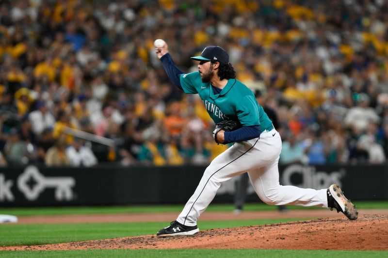 Aug 12, 2023; Seattle, Washington, USA; Seattle Mariners relief pitcher Andres Munoz (75) pitches to the Baltimore Orioles during the tenth inning at T-Mobile Park. Mandatory Credit: Steven Bisig-USA TODAY Sports