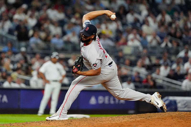 Sep 12, 2024; Bronx, New York, USA; Boston Red Sox pitcher Kenley Jansen (74) delivers a pitch against the New York Yankees during the ninth inning at Yankee Stadium. Mandatory Credit: Gregory Fisher-Imagn Images