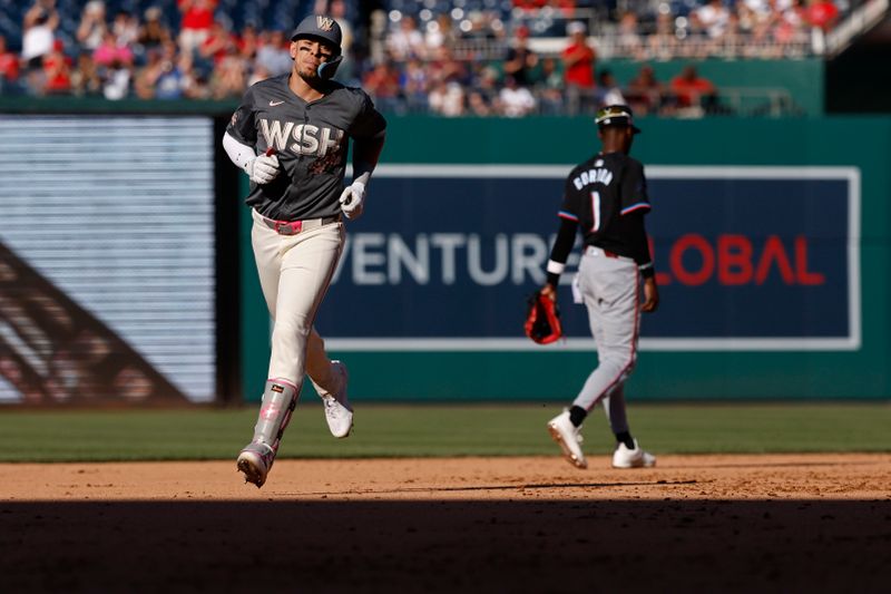 Jun 15, 2024; Washington, District of Columbia, USA; Washington Nationals first base Joey Meneses (45) rounds the bases past Miami Marlins second baseman Nick Gordon (1) after hitting a two run home run during the eighth inning at Nationals Park. Mandatory Credit: Geoff Burke-USA TODAY Sports