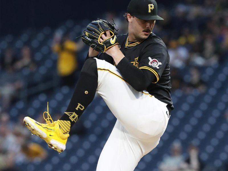 Jun 17, 2024; Pittsburgh, Pennsylvania, USA;  Pittsburgh Pirates starting pitcher Paul Skenes (30) delivers a pitch against the Cincinnati Reds during the first inning at PNC Park. Mandatory Credit: Charles LeClaire-USA TODAY Sports