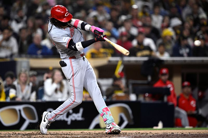 Apr 30, 2024; San Diego, California, USA; Cincinnati Reds shortstop Elly De La Cruz (44) hits a single against the San Diego Padres during the fifth inning at Petco Park. Mandatory Credit: Orlando Ramirez-USA TODAY Sports