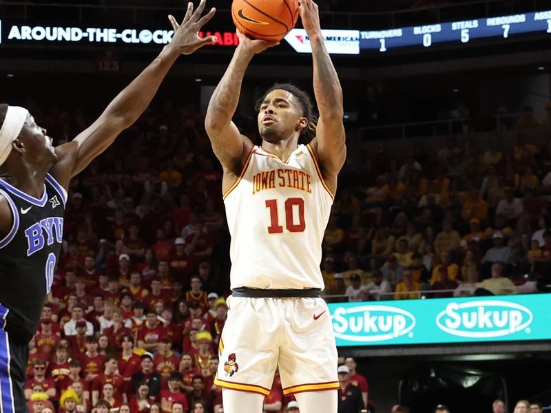 Mar 4, 2025; Ames, Iowa, USA;  Iowa State Cyclones guard Keshon Gilbert (10) shoots against the Brigham Young Cougars in the first half at James H. Hilton Coliseum. Mandatory Credit: Reese Strickland-Imagn Images