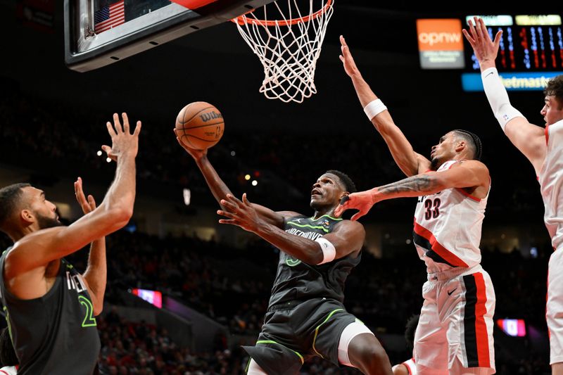 PORTLAND, OREGON - NOVEMBER 13: Anthony Edwards #5 of the Minnesota Timberwolves drives to the basket during the second quarter of the game against the Portland Trail Blazers at Moda Center on November 13, 2024 in Portland, Oregon. NOTE TO USER: User expressly acknowledges and agrees that, by downloading and or using this photograph, User is consenting to the terms and conditions of the Getty Images License Agreement. (Photo by Alika Jenner/Getty Images)