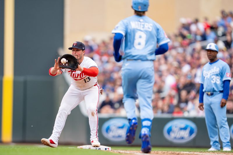 May 24, 2025; Minneapolis, Minnesota, USA; Kansas City Royals center fielder Drew Waters (8) is thrown out as Minnesota Twins first base Ty France (13) catches the ball from Minnesota Twins pitcher Jhoan Duran (59) to end the ninth inning at Target Field. Mandatory Credit: Matt Blewett-Imagn Images