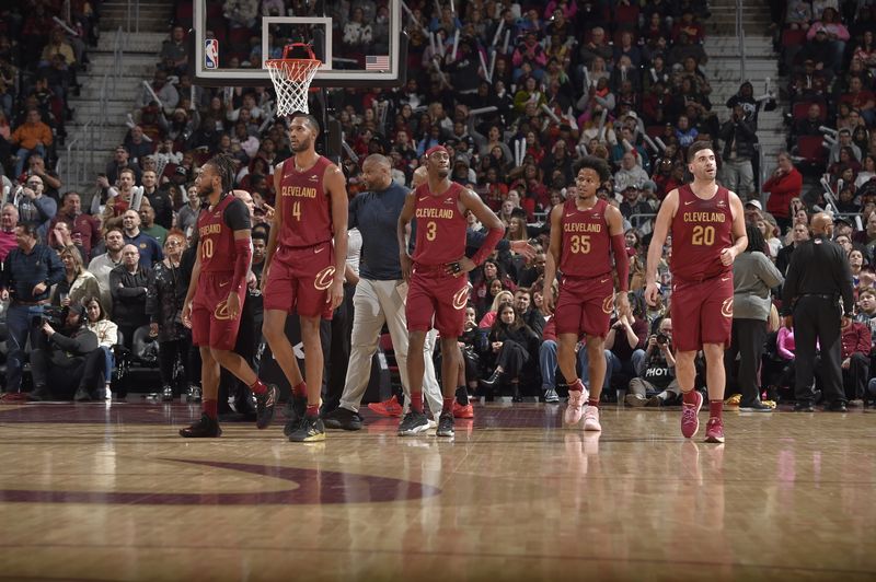 CLEVELAND, OH - FEBRUARY 14: The Cleveland Cavaliers walk towards the bench during the game against the Chicago Bulls on February 14, 2024 at Rocket Mortgage FieldHouse in Cleveland, Ohio. NOTE TO USER: User expressly acknowledges and agrees that, by downloading and/or using this Photograph, user is consenting to the terms and conditions of the Getty Images License Agreement. Mandatory Copyright Notice: Copyright 2024 NBAE (Photo by David Liam Kyle/NBAE via Getty Images)