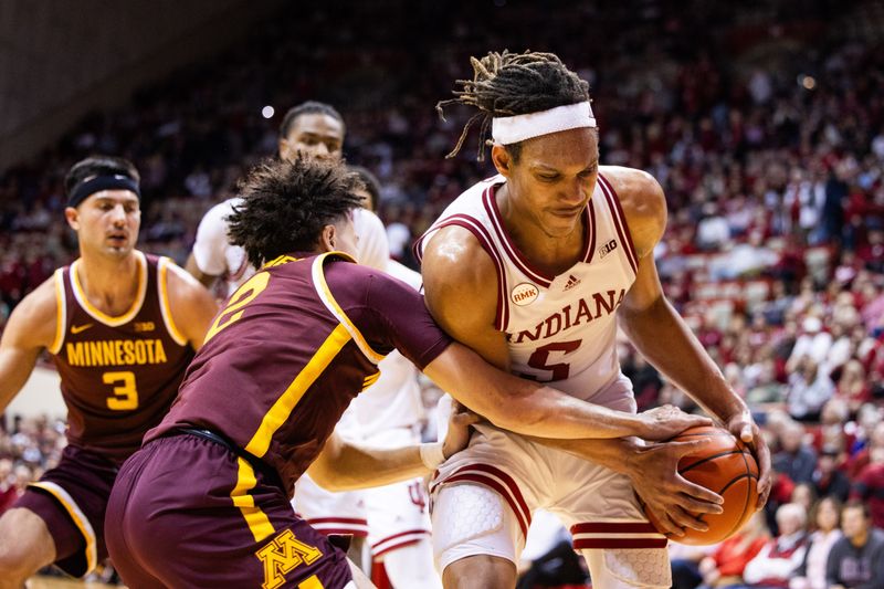 Jan 12, 2024; Bloomington, Indiana, USA; Minnesota Golden Gophers guard Mike Mitchell Jr. (2) fouls Indiana Hoosiers forward Malik Reneau (5) in the second half at Simon Skjodt Assembly Hall. Mandatory Credit: Trevor Ruszkowski-USA TODAY Sports