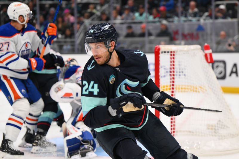 Oct 2, 2024; Seattle, Washington, USA; Seattle Kraken defenseman Jamie Oleksiak (24) during the third period against the Edmonton Oilers at Climate Pledge Arena. Mandatory Credit: Steven Bisig-Imagn Images