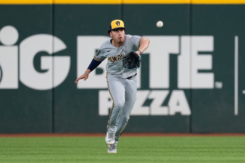 Aug 20, 2023; Arlington, Texas, USA; Milwaukee Brewers right fielder Tyrone Taylor (15) catches the fly out hit by Texas Rangers left fielder Travis Jankowski (not shown) during the eighth inning at Globe Life Field. Mandatory Credit: Jim Cowsert-USA TODAY Sports