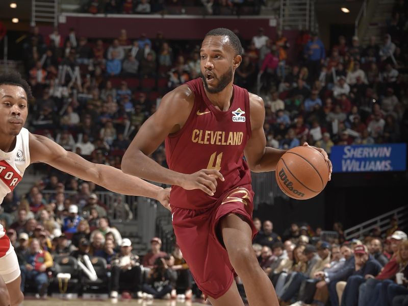 CLEVELAND, OH - JANUARY 9: Evan Mobley #4 of the Cleveland Cavaliers drives to the basket during the game against the Toronto Raptors on January 9, 2025 at Rocket Mortgage FieldHouse in Cleveland, Ohio. NOTE TO USER: User expressly acknowledges and agrees that, by downloading and/or using this Photograph, user is consenting to the terms and conditions of the Getty Images License Agreement. Mandatory Copyright Notice: Copyright 2025 NBAE (Photo by David Liam Kyle/NBAE via Getty Images)