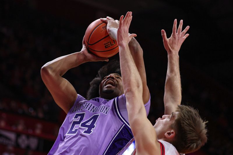 Feb 24, 2026; Piscataway, New Jersey, USA;  Washington Huskies center Lathan Sommerville (24) goes to the basket against Rutgers Scarlet Knights guard Harun Zrno (13) during the first half at Jersey Mike's Arena. Mandatory Credit: Vincent Carchietta-Imagn Images