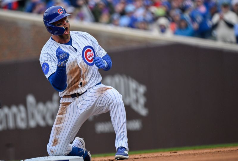 Mar 26, 2026; Chicago, Illinois, USA;  Chicago Cubs first baseman Michael Busch (29) reacts after hitting a double against the Washington Nationals during the first inning at Wrigley Field. Mandatory Credit: Matt Marton-Imagn Images