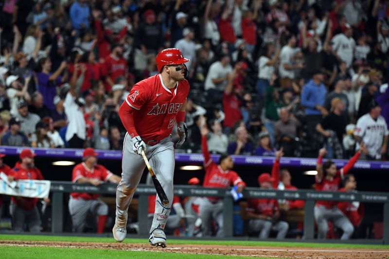 Sep 20, 2025; Denver, Colorado, USA; Los Angeles Angels designated hitter Mike Trout (27) watches after hitting his 400th career home run during the eighth inning against the Colorado Rockies at Coors Field. Mandatory Credit: Christopher Hanewinckel-Imagn Images