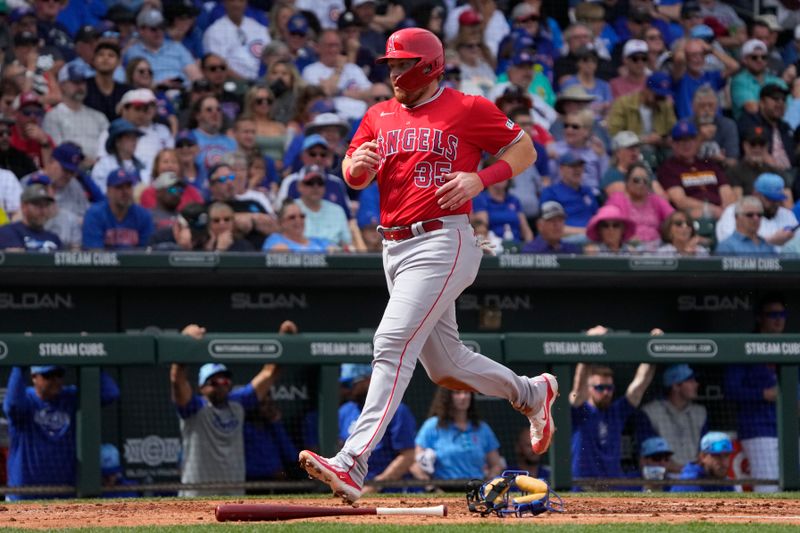 Mar 6, 2024; Mesa, Arizona, USA; Los Angeles Angels catcher Chad Wallach (35) scores a run against the Chicago Cubs in the third inning at Sloan Park. Mandatory Credit: Rick Scuteri-USA TODAY Sports