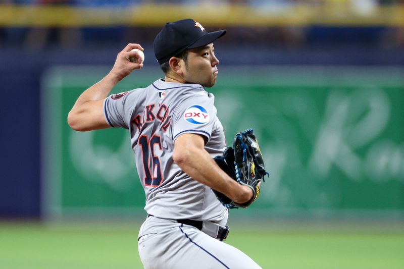 Aug 13, 2024; St. Petersburg, Florida, USA; Houston Astros pitcher Yusei Kikuchi (16) throws a pitch against the Tampa Bay Rays in the third inning at Tropicana Field. Mandatory Credit: Nathan Ray Seebeck-USA TODAY Sports