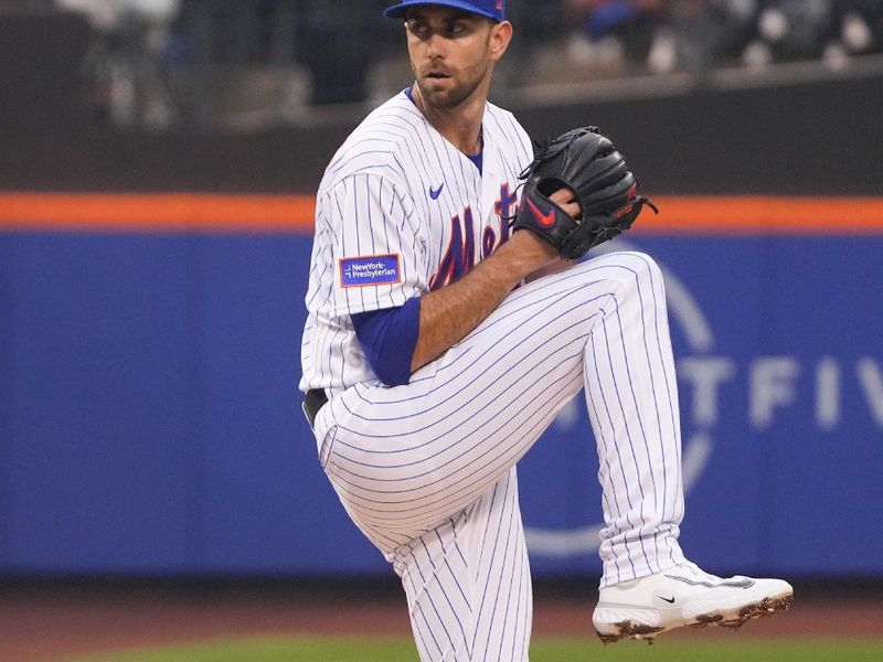 Jul 2, 2023; New York City, New York, USA; New York Mets pitcher David Peterson (23) delivers a pitch against the San Francisco Giants during the first inning at Citi Field. Mandatory Credit: Gregory Fisher-USA TODAY Sports