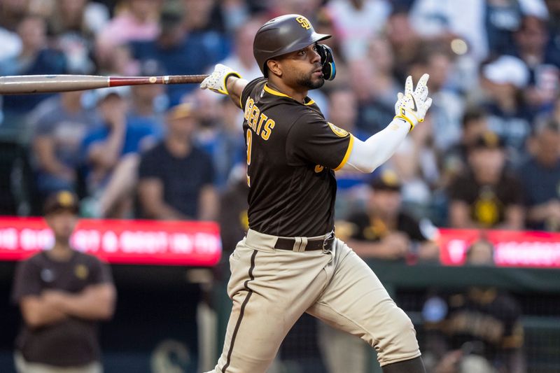 Aug 9, 2023; Seattle, Washington, USA; San Diego Padres shortstop Xander Bogaerts (2) hits a single during the sixth inning against the Seattle Mariners at T-Mobile Park. Mandatory Credit: Stephen Brashear-USA TODAY Sports