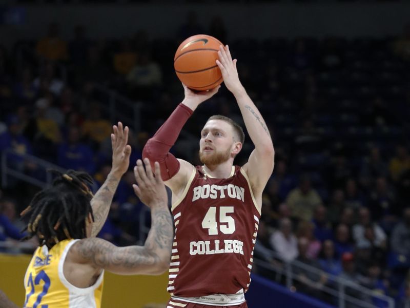 Feb 14, 2023; Pittsburgh, Pennsylvania, USA;  Boston College Eagles guard Mason Madsen (45) shoots against Pittsburgh Panthers guard Nike Sibande (22) during the second half at the Petersen Events Center.  Pittsburgh won 77-58. Mandatory Credit: Charles LeClaire-USA TODAY Sports