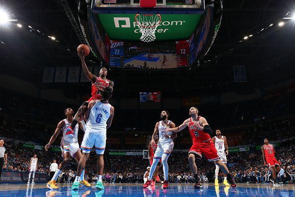 OKLAHOMA CITY, OK - NOVEMBER 22:  Ayo Dosunmu #12 of the Chicago Bulls drives to the basket during the game against the Oklahoma City Thunder on November 22, 2023 at Paycom Arena in Oklahoma City, Oklahoma. NOTE TO USER: User expressly acknowledges and agrees that, by downloading and or using this photograph, User is consenting to the terms and conditions of the Getty Images License Agreement. Mandatory Copyright Notice: Copyright 2023 NBAE (Photo by Zach Beeker/NBAE via Getty Images)