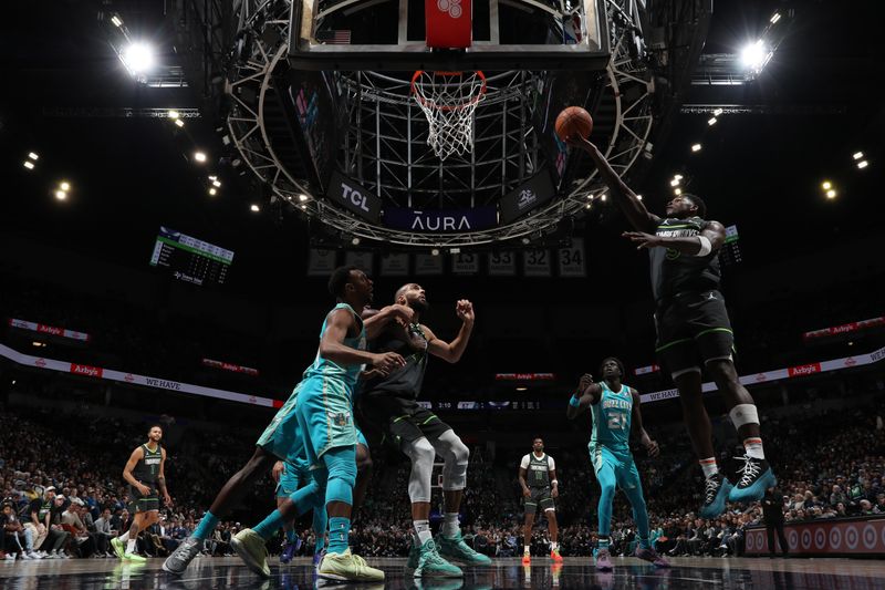 MINNEAPOLIS, MN -  JANUARY 22: Anthony Edwards #5 of the Minnesota Timberwolves drives to the basket during the game against the Charlotte Hornets on January 22, 2024 at Target Center in Minneapolis, Minnesota. NOTE TO USER: User expressly acknowledges and agrees that, by downloading and or using this Photograph, user is consenting to the terms and conditions of the Getty Images License Agreement. Mandatory Copyright Notice: Copyright 2024 NBAE (Photo by Jordan Johnson/NBAE via Getty Images)