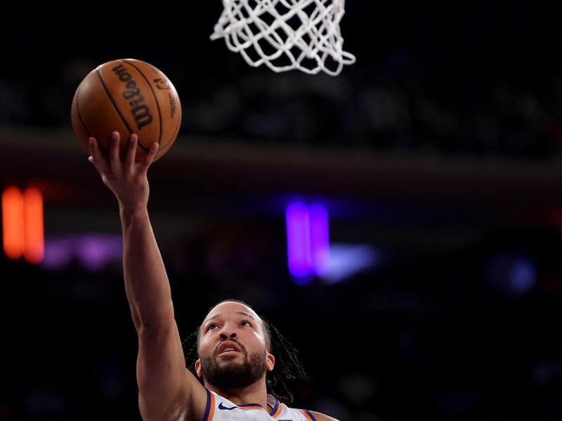 NEW YORK, NEW YORK - FEBRUARY 12:  Jalen Brunson #11 of the New York Knicks heads for the net in the first half against the Atlanta Hawks at Madison Square Garden on February 12, 2025 in New York City. NOTE TO USER: User expressly acknowledges and agrees that, by downloading and or using this photograph, User is consenting to the terms and conditions of the Getty Images License Agreement. (Photo by Elsa/Getty Images)