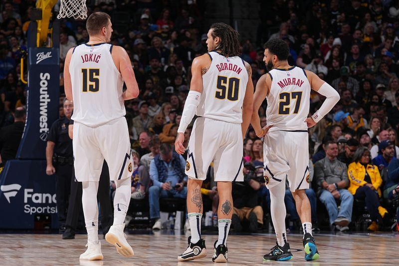 DENVER, CO - FEBRUARY 4: Nikola Jokic #15, Aaron Gordon #50, and Jamal Murray #27 of the Denver Nuggets talk during the game against the Portland Trail Blazers on February 4, 2024 at the Ball Arena in Denver, Colorado. NOTE TO USER: User expressly acknowledges and agrees that, by downloading and/or using this Photograph, user is consenting to the terms and conditions of the Getty Images License Agreement. Mandatory Copyright Notice: Copyright 2024 NBAE (Photo by Bart Young/NBAE via Getty Images)