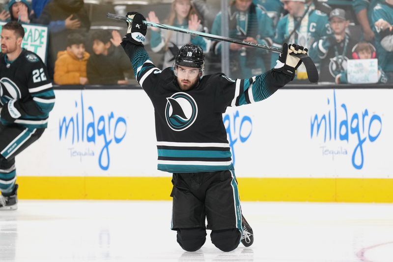 Feb 17, 2024; San Jose, California, USA; San Jose Sharks right wing Filip Zadina (18) warms up while wearing the new cali fin jersey before the game against the Columbus Blue Jackets at SAP Center at San Jose. Mandatory Credit: Darren Yamashita-USA TODAY Sports