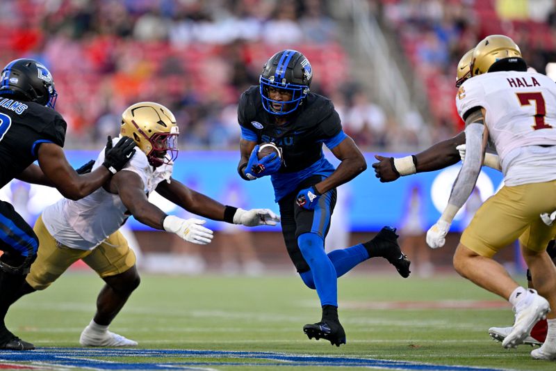 Nov 16, 2024; Dallas, Texas, USA; SMU Mustangs running back Brashard Smith (1) runs with the ball against the Boston College Eagles during the second half at Gerald J. Ford Stadium. Mandatory Credit: Jerome Miron-Imagn Images