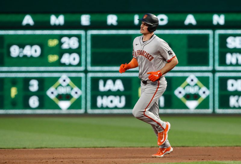 May 22, 2024; Pittsburgh, Pennsylvania, USA;  San Francisco Giants third baseman Matt Chapman (26) circles the bases after hitting a two run home run against Pittsburgh Pirates during the sixth inning at PNC Park. Mandatory Credit: Charles LeClaire-USA TODAY Sports