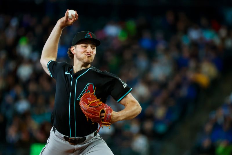 Apr 28, 2024; Seattle, Washington, USA; Arizona Diamondbacks starting pitcher Brandon Pfaadt (32) throws against the Seattle Mariners during the fourth inning at T-Mobile Park. Mandatory Credit: Joe Nicholson-USA TODAY Sports