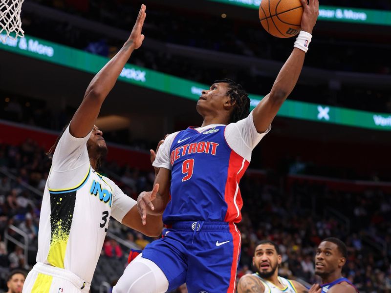 DETROIT, MICHIGAN - JANUARY 16: Ausar Thompson #9 of the Detroit Pistons takes a shot over Myles Turner #33 of the Indiana Pacers during the first half at Little Caesars Arena on January 16, 2025 in Detroit, Michigan. NOTE TO USER: User expressly acknowledges and agrees that, by downloading and or using this photograph, User is consenting to the terms and conditions of the Getty Images License. (Photo by Gregory Shamus/Getty Images)