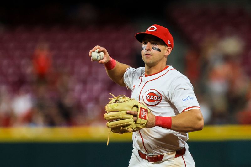 Aug 12, 2024; Cincinnati, Ohio, USA; Cincinnati Reds second baseman Spencer Steer (7) throws to first to get St. Louis Cardinals second baseman Brendan Donovan (not pictured) out in the ninth inning at Great American Ball Park. Mandatory Credit: Katie Stratman-USA TODAY Sports