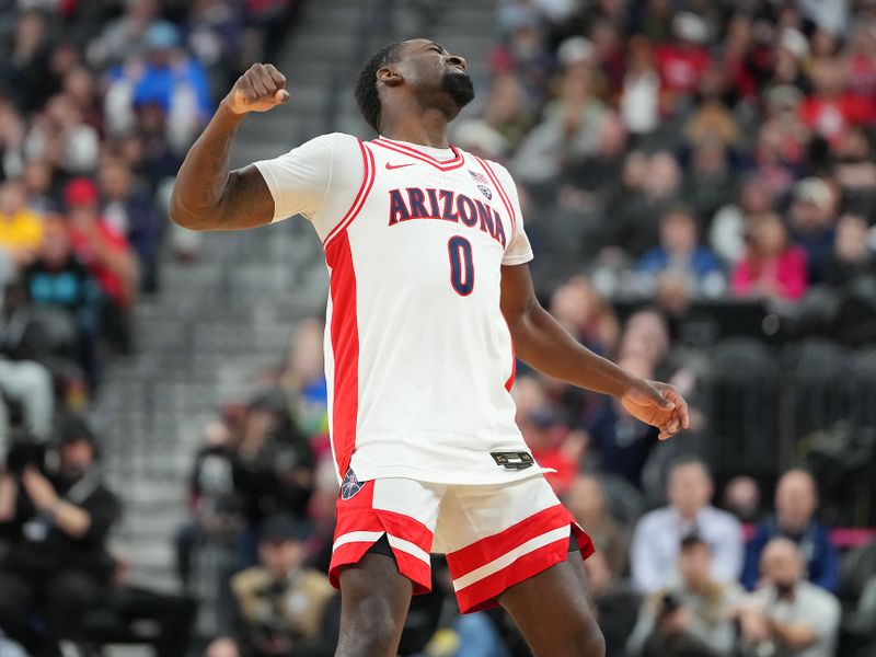 Mar 9, 2023; Las Vegas, NV, USA; Arizona Wildcats guard Courtney Ramey (0) celebrates after scoring against the Stanford Cardinal during the second half at T-Mobile Arena. Mandatory Credit: Stephen R. Sylvanie-USA TODAY Sports