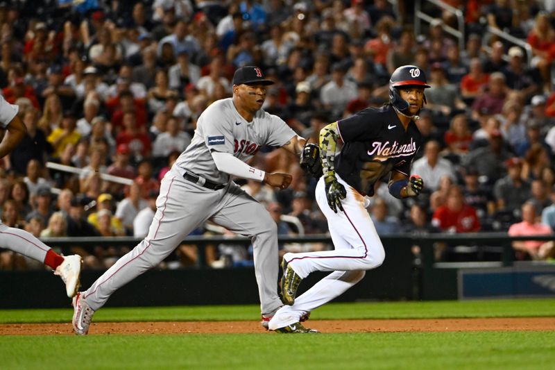 Aug 16, 2023; Washington, District of Columbia, USA; Boston Red Sox third baseman Rafael Devers (11) tags out Washington Nationals shortstop CJ Abrams (5) trying to advance to third base during the fifth inning at Nationals Park. Mandatory Credit: Brad Mills-USA TODAY Sports