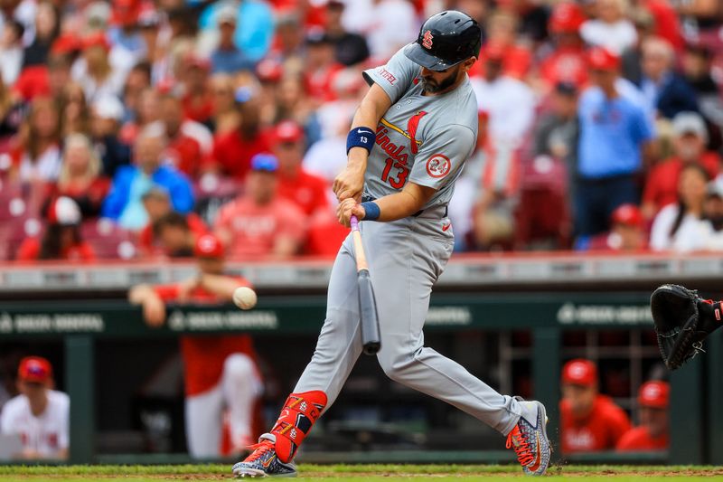 May 29, 2024; Cincinnati, Ohio, USA; St. Louis Cardinals designated hitter Matt Carpenter (13) hits a solo home run in the third inning against the Cincinnati Reds at Great American Ball Park. Mandatory Credit: Katie Stratman-USA TODAY Sports